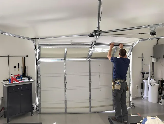 Hollywood Garage Door Repair specialist performing precise section replacement on Hollywood garage door